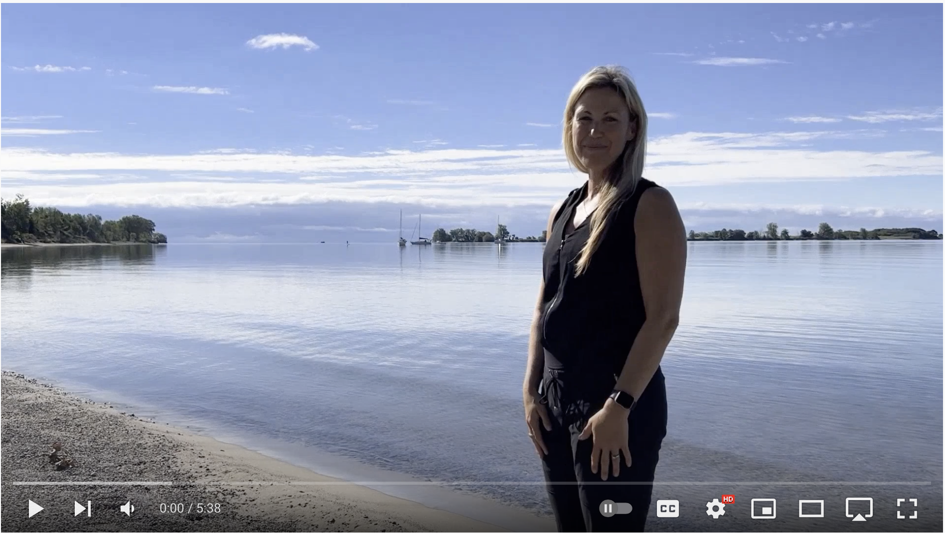 Shelby Kramp-Neuman on the edge of Lake Ontario on Amherst Island